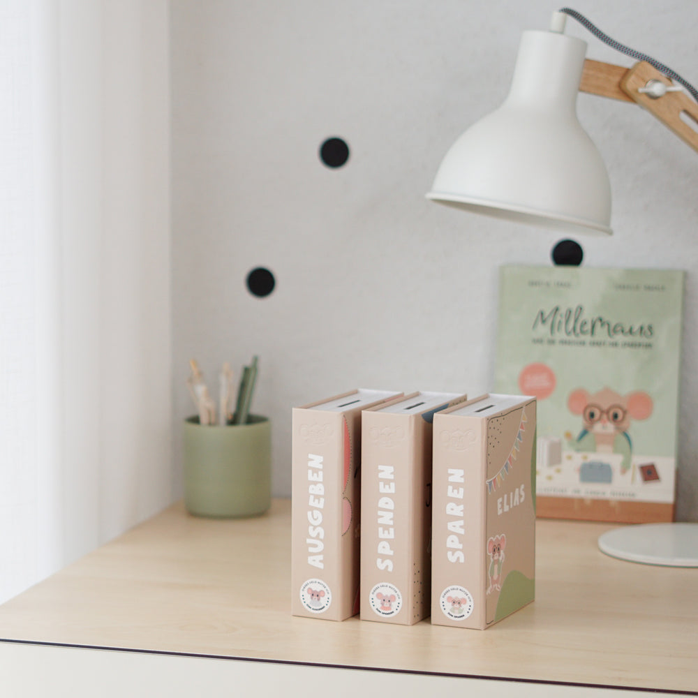 
                      
                        Modulares Spardosen-System in Buchform
                      
                    